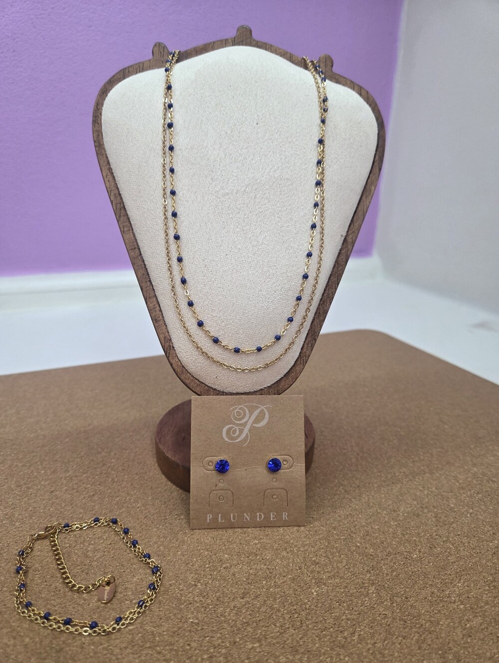 Plunder Gold-Tone Layered Necklace, Blue Stud Earring, And Layered Bracelet Set